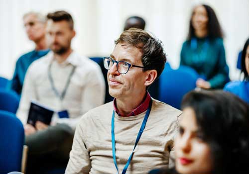 Man-Listening-to-Speaker-500x350 Emotional Intelligence Model